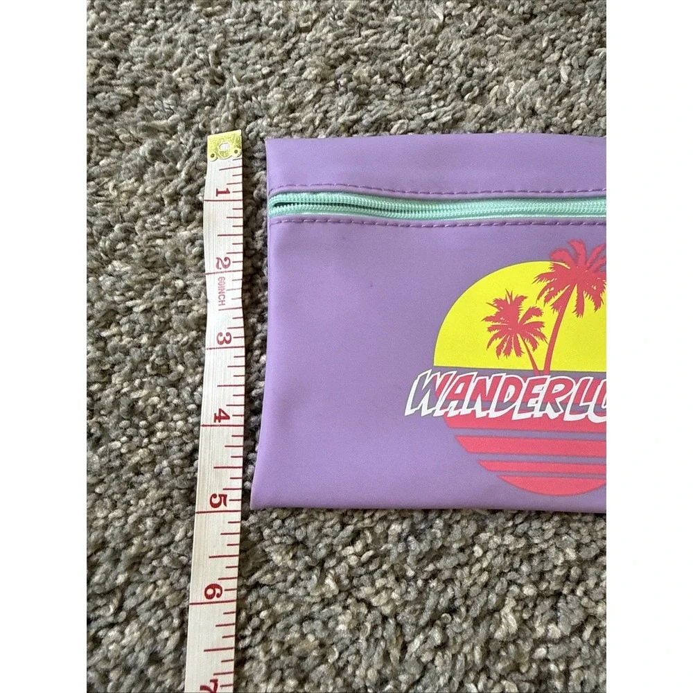 IPSY - Wanderlust - Purple Glam Bag - Airplane Zipper Charm‎
